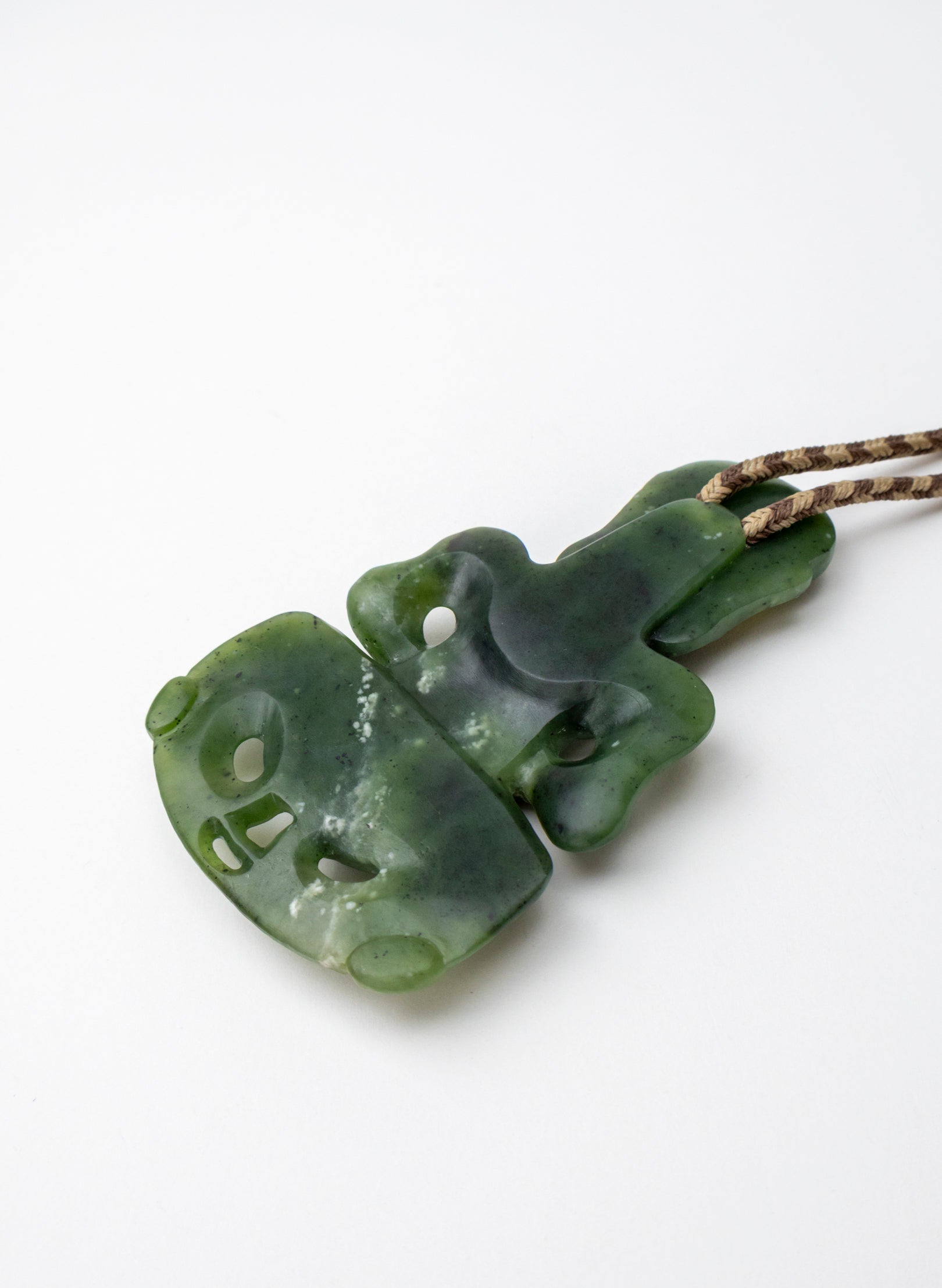 Pounamu -  Hei Tiki With Sapphire Trillian