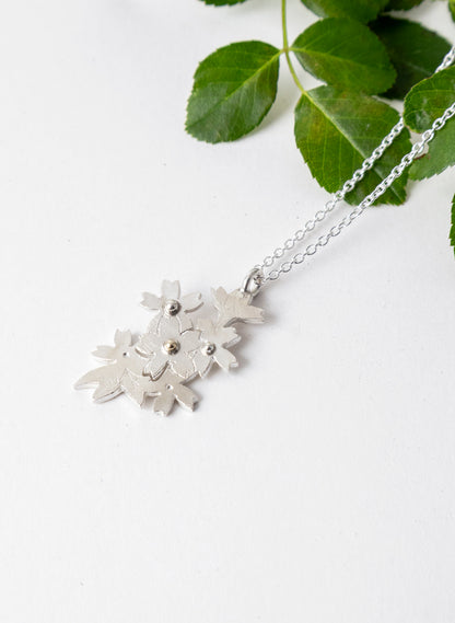 Cut Out Cherry Blossom Pendant