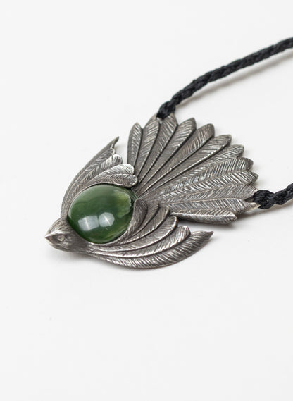 Sterling Silver Piwakawaka Pendant with a Pounamu Insert