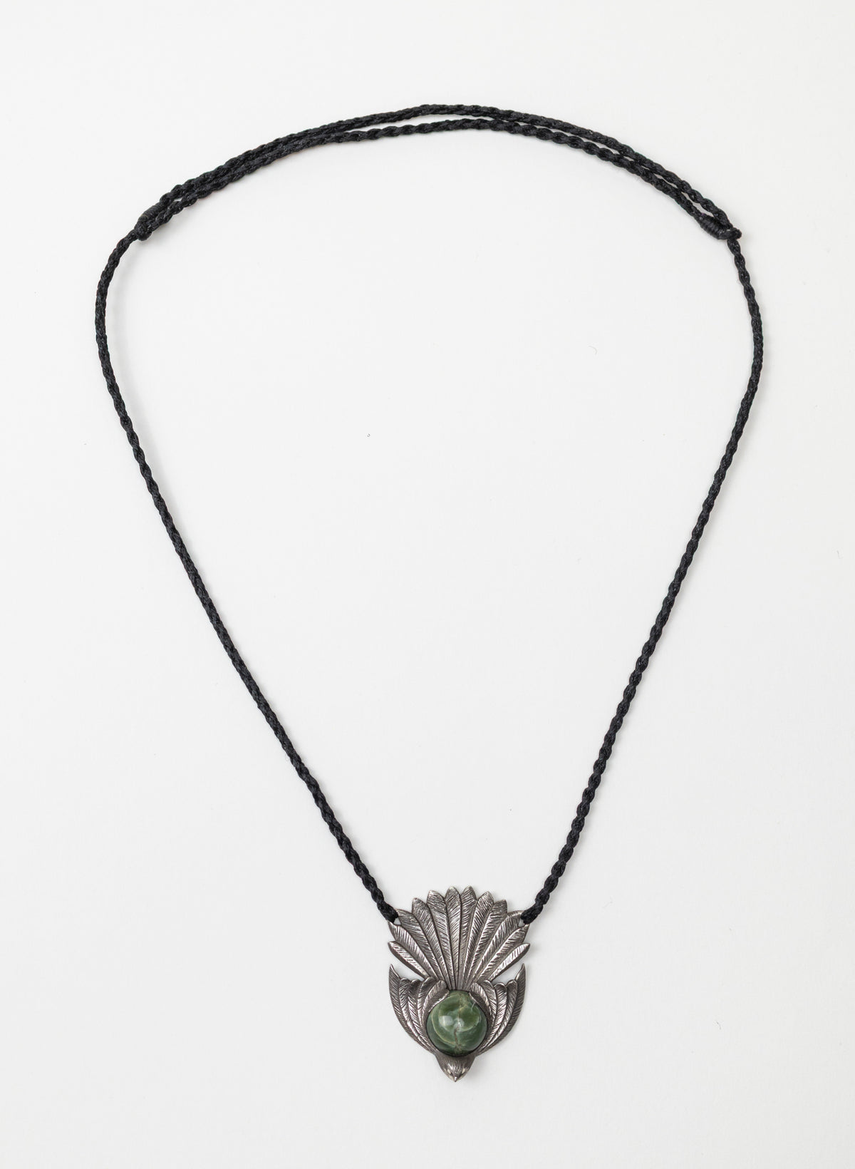 Sterling Silver Piwakawaka Pendant with a Pounamu Insert