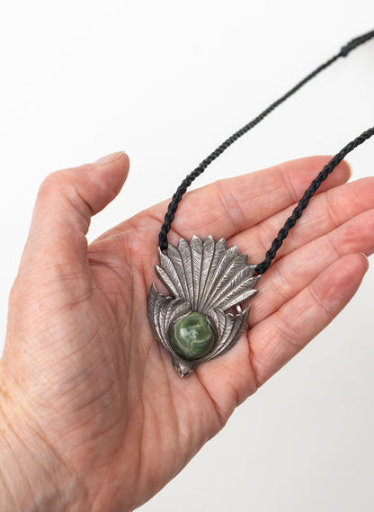 Sterling Silver Piwakawaka Pendant with a Pounamu Insert