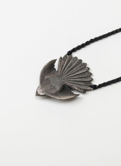 Sterling Silver Piwakawaka Pendant with a Pounamu Insert