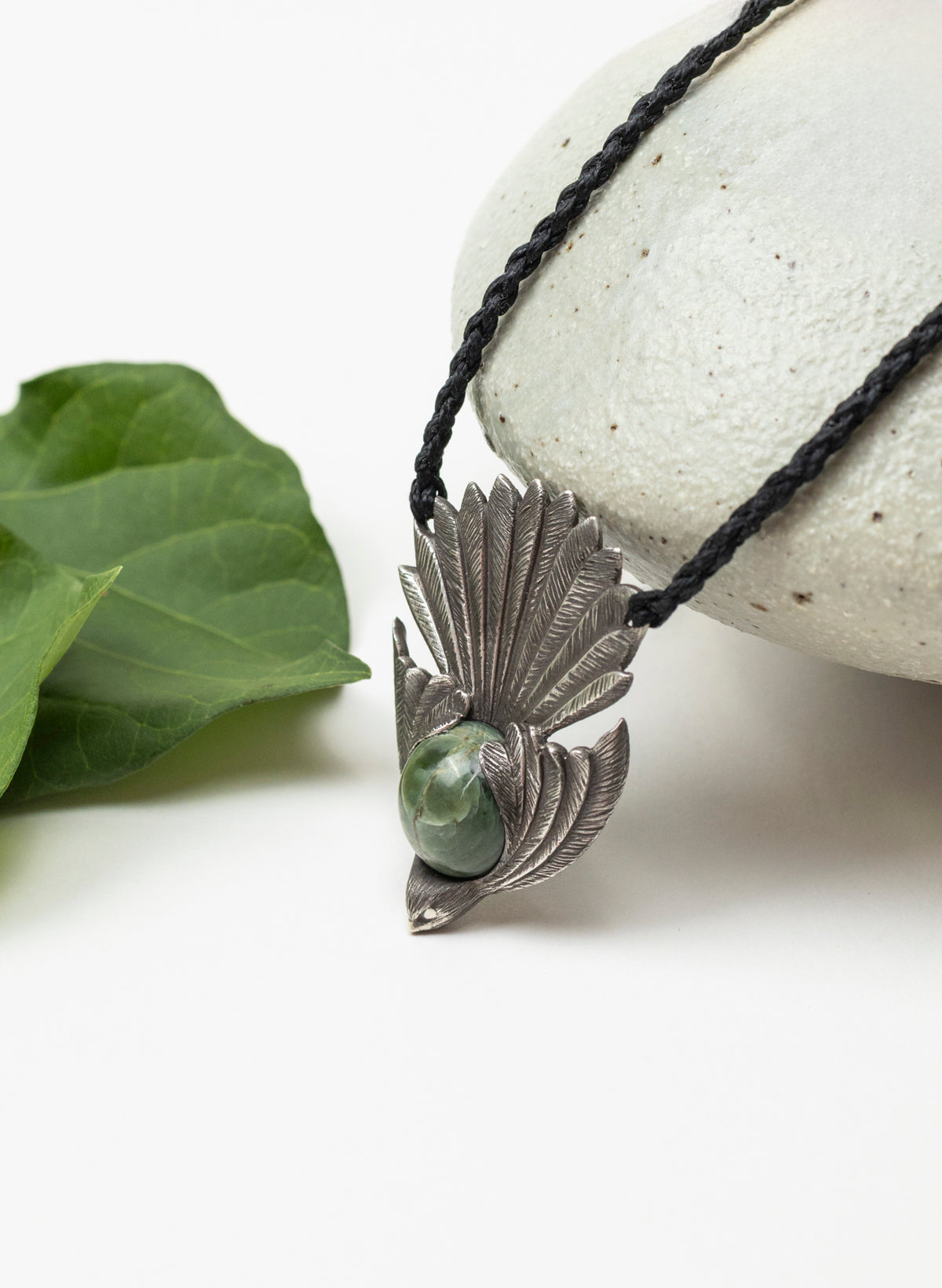 Sterling Silver Piwakawaka Pendant with a Pounamu Insert