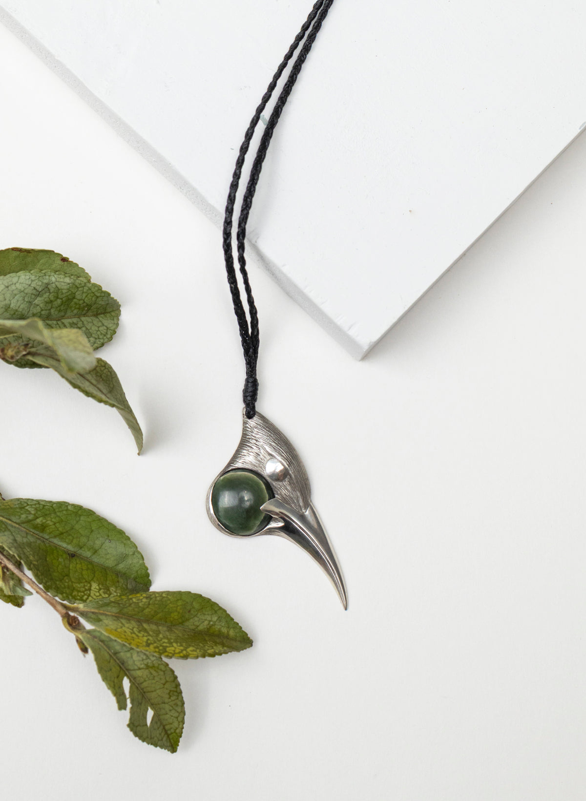 Sterling Silver Male Huia Pendant with a Pounamu Insert