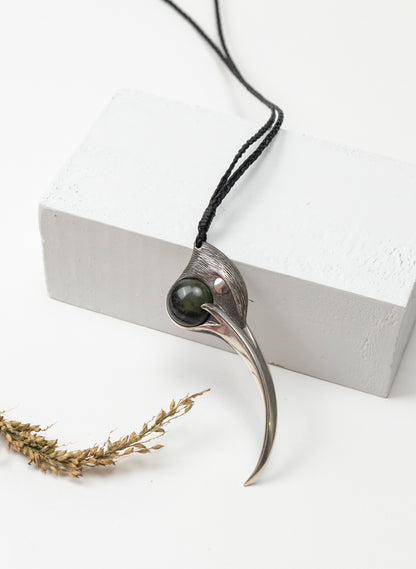 Sterling Silver Female Huia Pendant with a Pounamu Insert