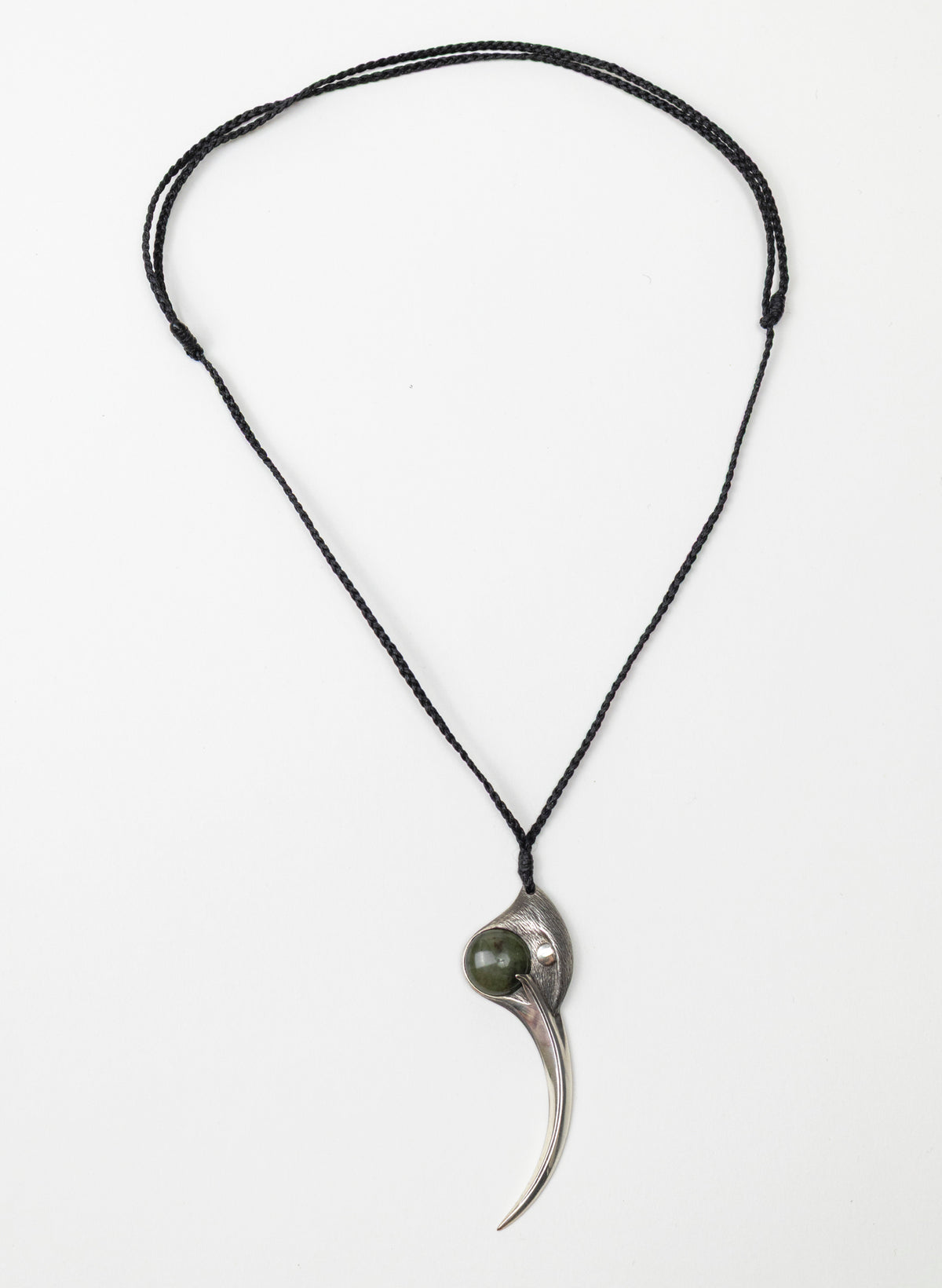 Sterling Silver Female Huia Pendant with a Pounamu Insert