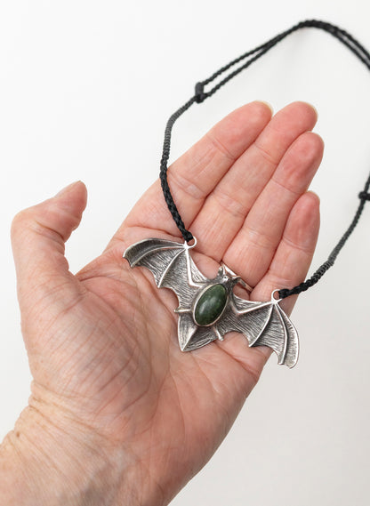 Sterling Silver Pekapeka Pendant with a Pounamu Insert