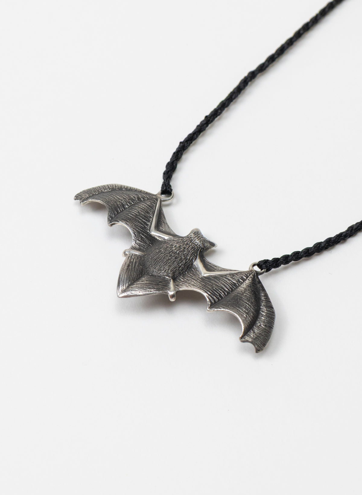 Sterling Silver Pekapeka Pendant with a Pounamu Insert
