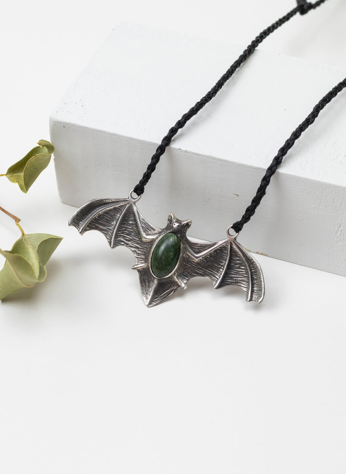 Sterling Silver Pekapeka Pendant with a Pounamu Insert