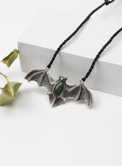 Sterling Silver Pekapeka Pendant with a Pounamu Insert