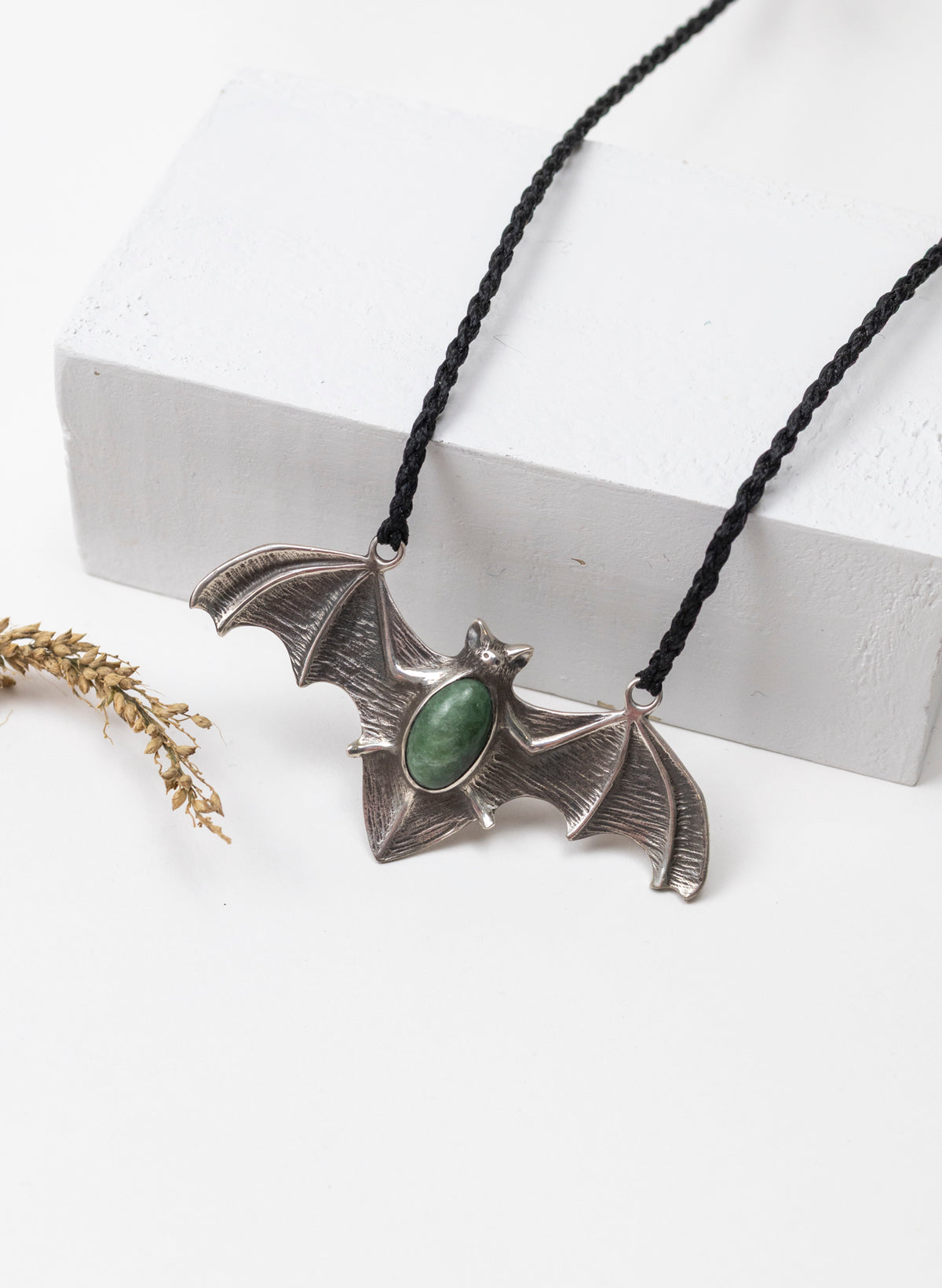 Sterling Silver Pekapeka Pendant with a Pounamu Insert