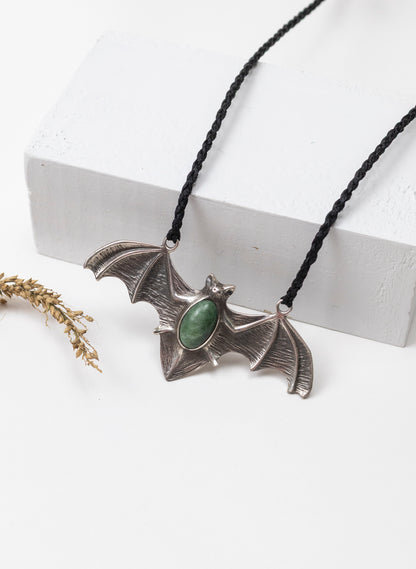 Sterling Silver Pekapeka Pendant with a Pounamu Insert
