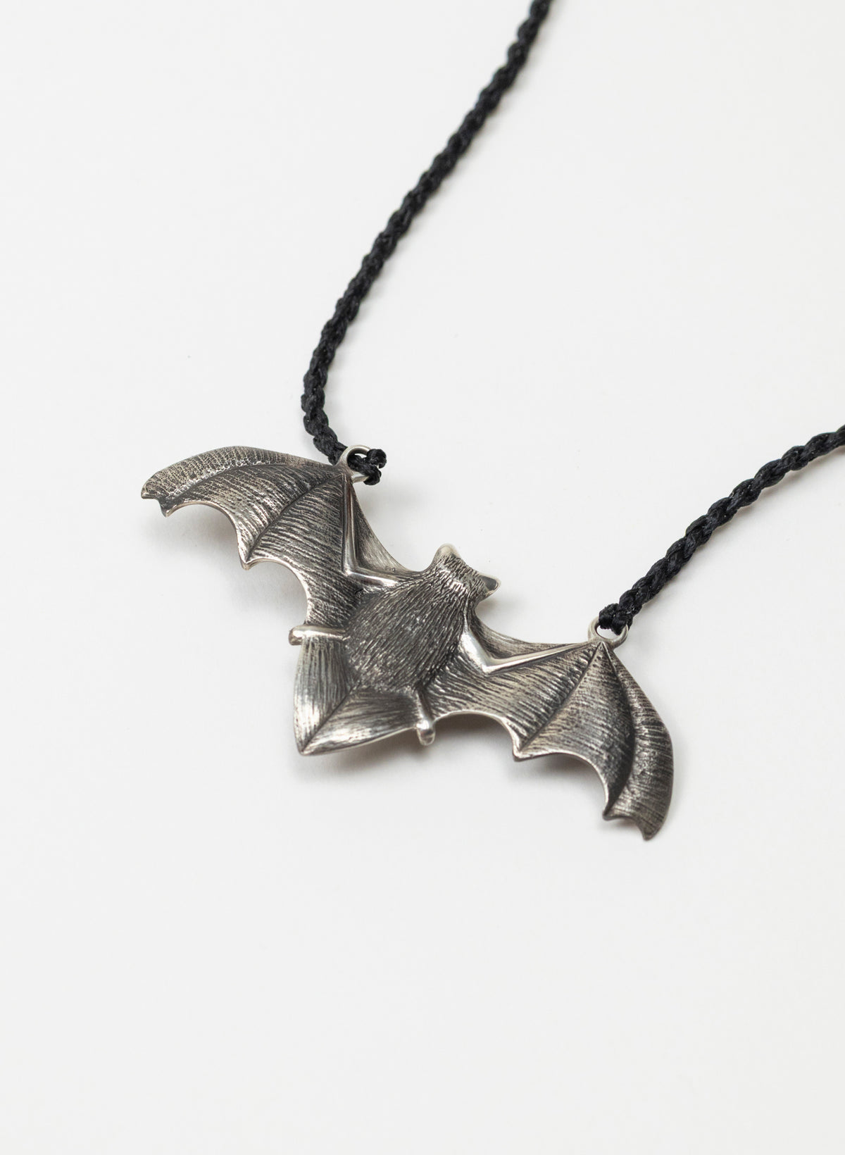 Sterling Silver Pekapeka Pendant with a Pounamu Insert
