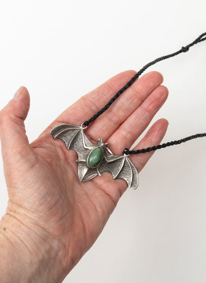 Sterling Silver Pekapeka Pendant with a Pounamu Insert