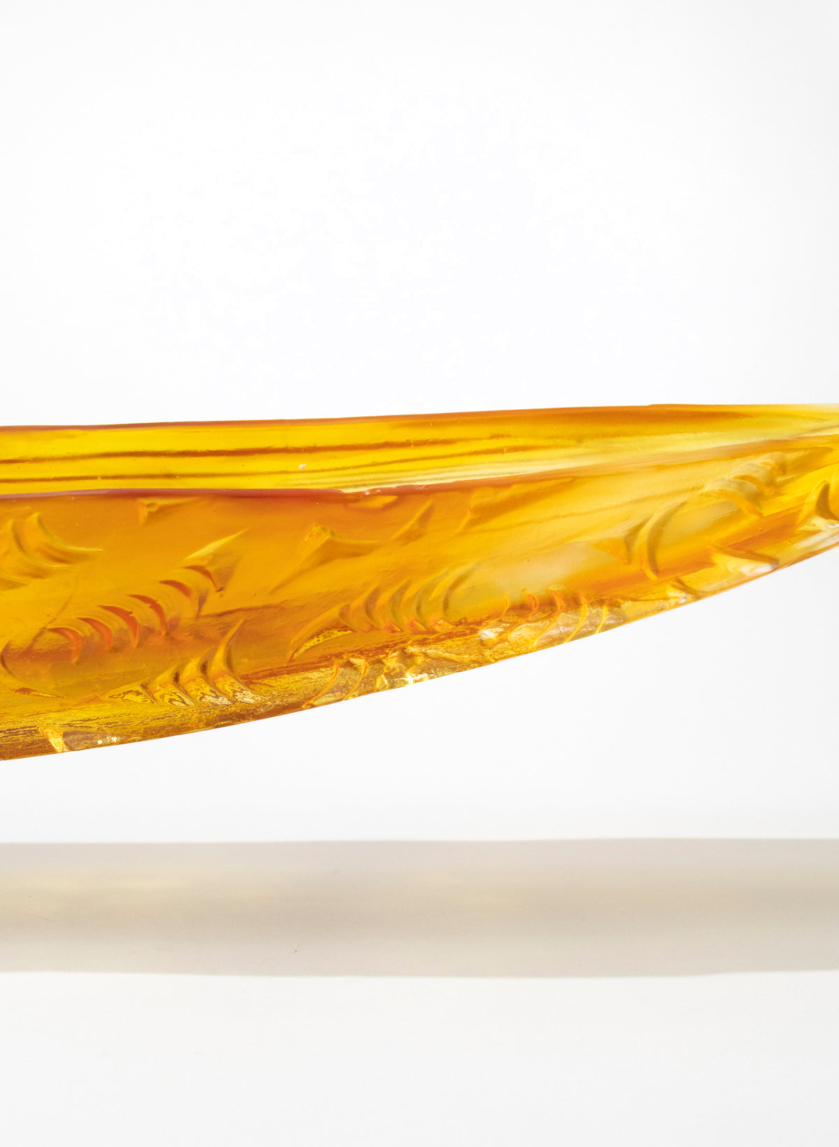 Orange Red Seed Pod with Pūhoro Design