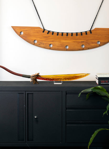 Orange Red Seed Pod with Pūhoro Design