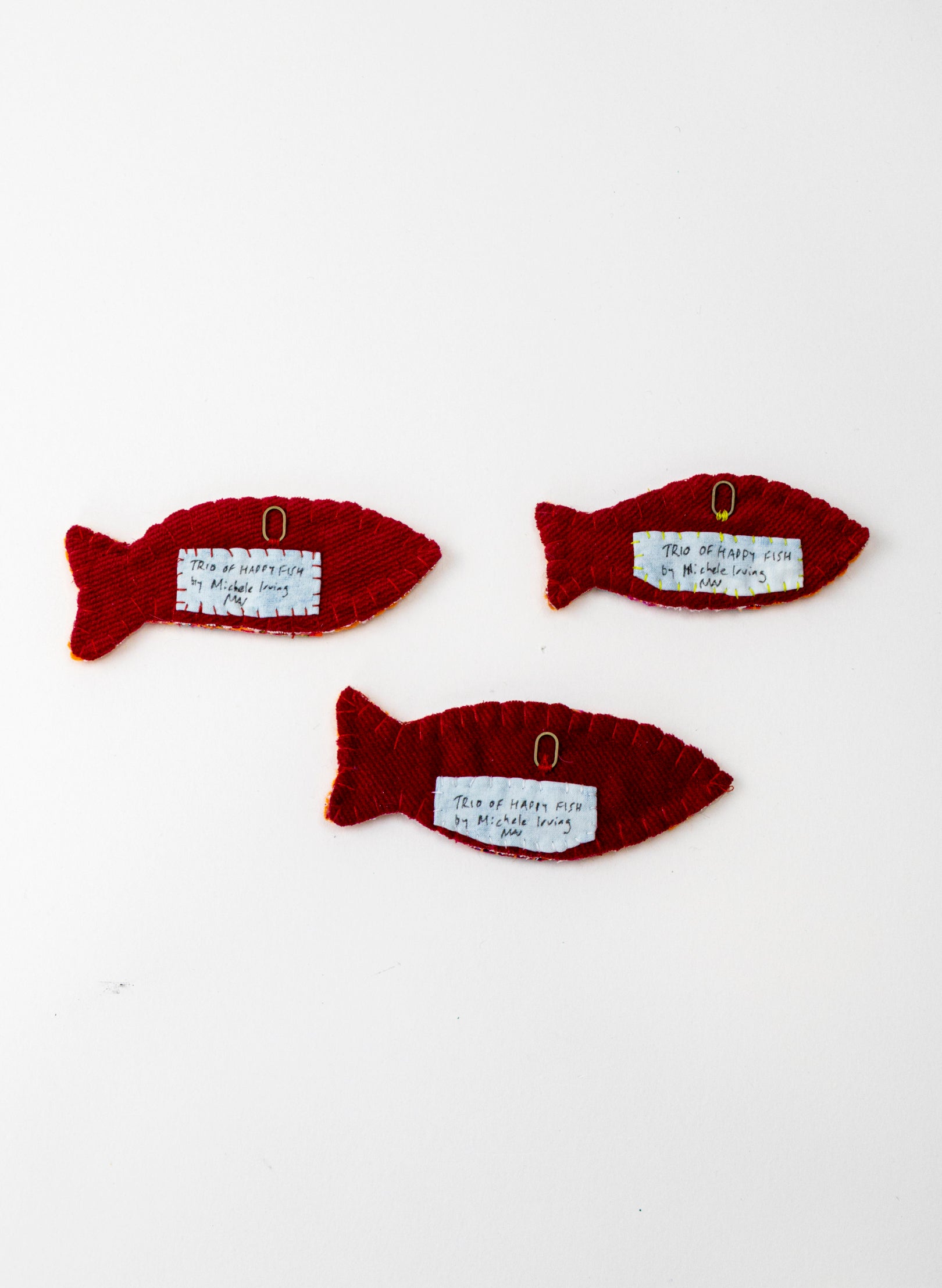 Trio Of Orange Happy Fish