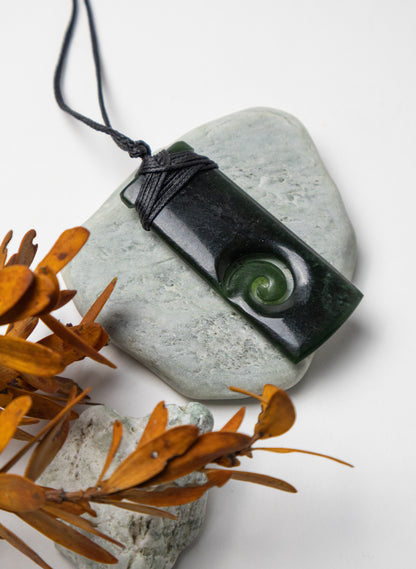 Bound Pounamu Toki with Koru