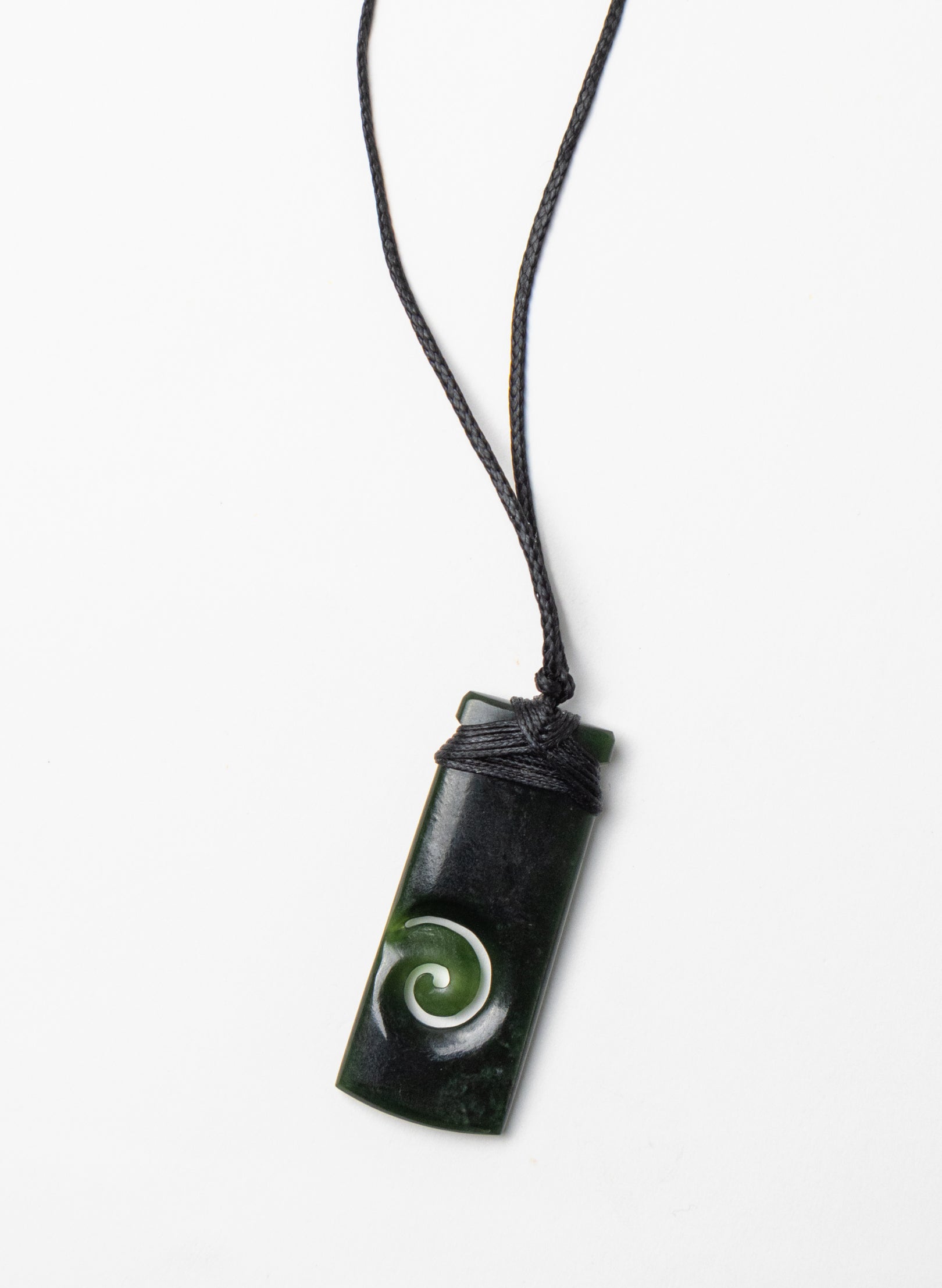 Bound Pounamu Toki with Koru
