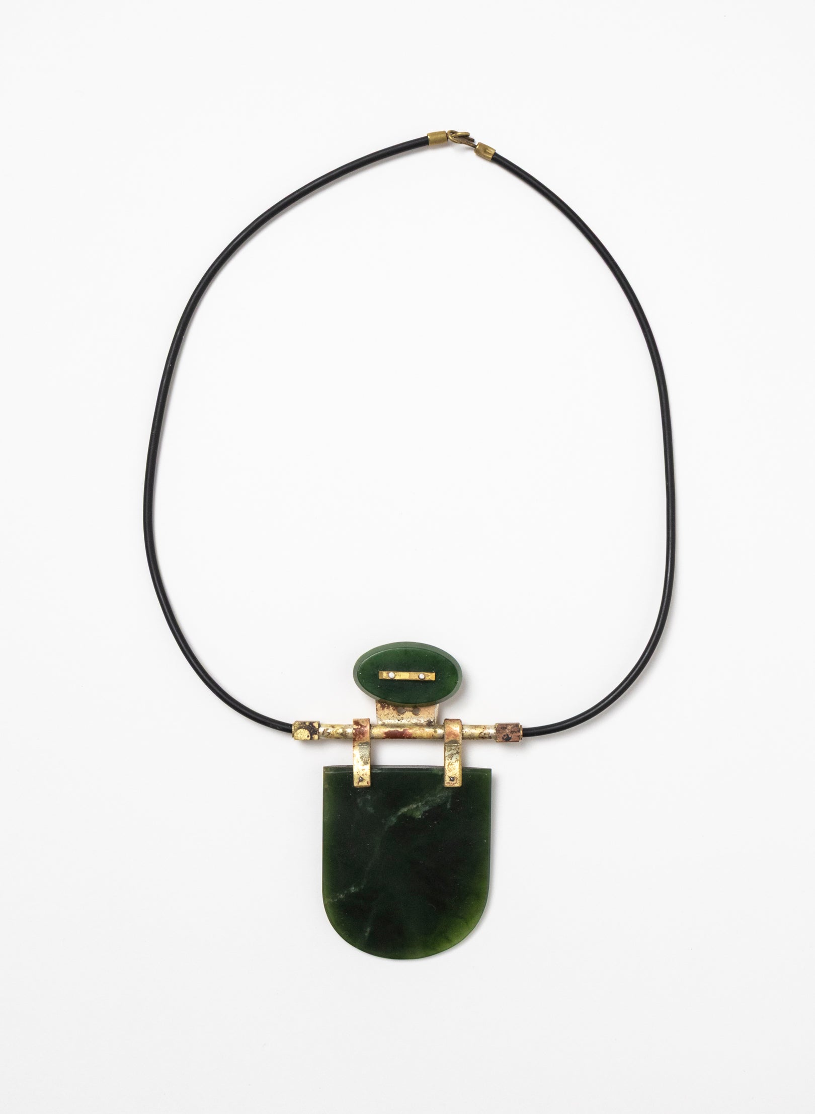 Brass, Rubber and NZ Pounamu Necklace with Stand