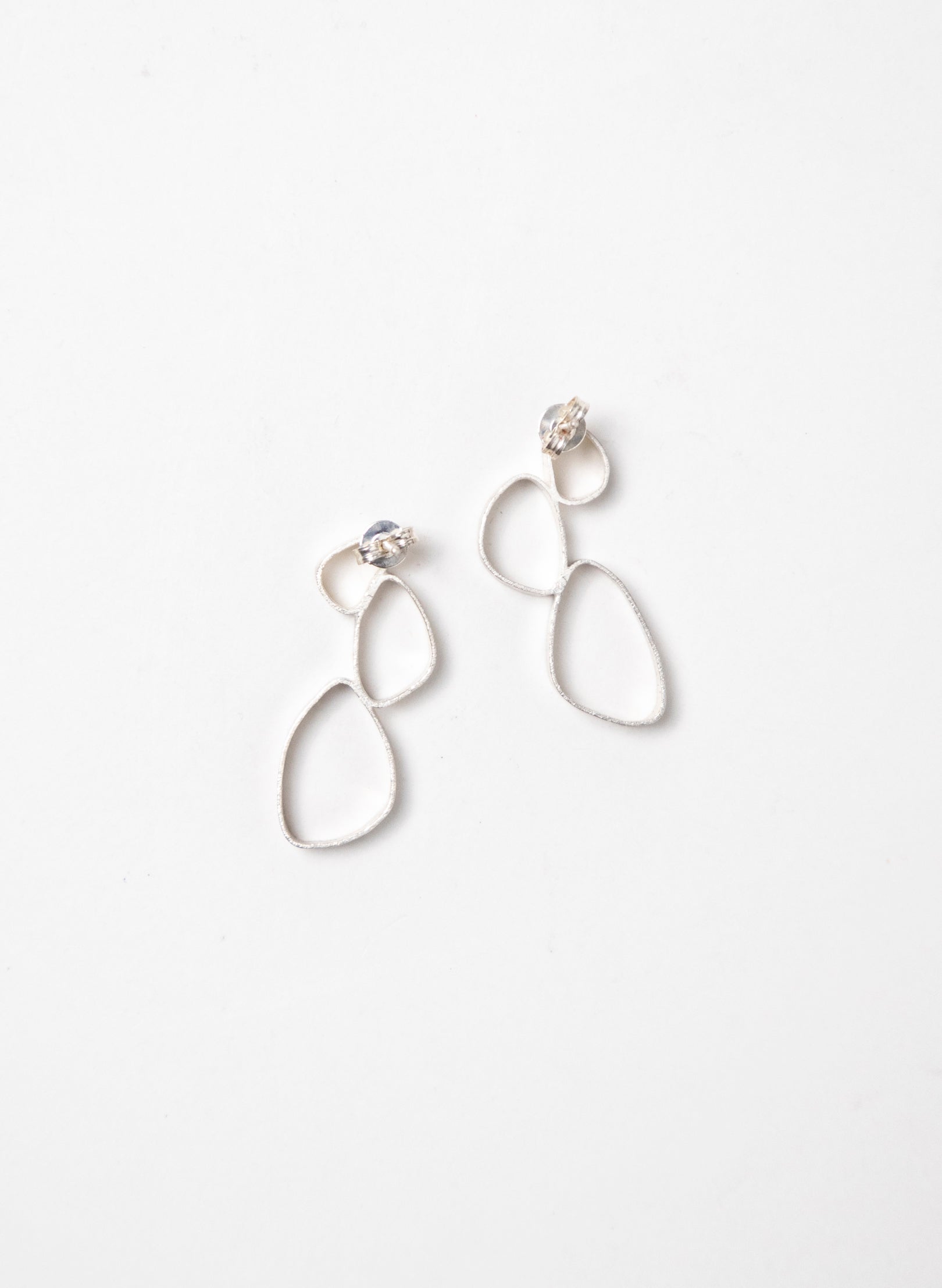 Hollow 3 Pebble Earrings