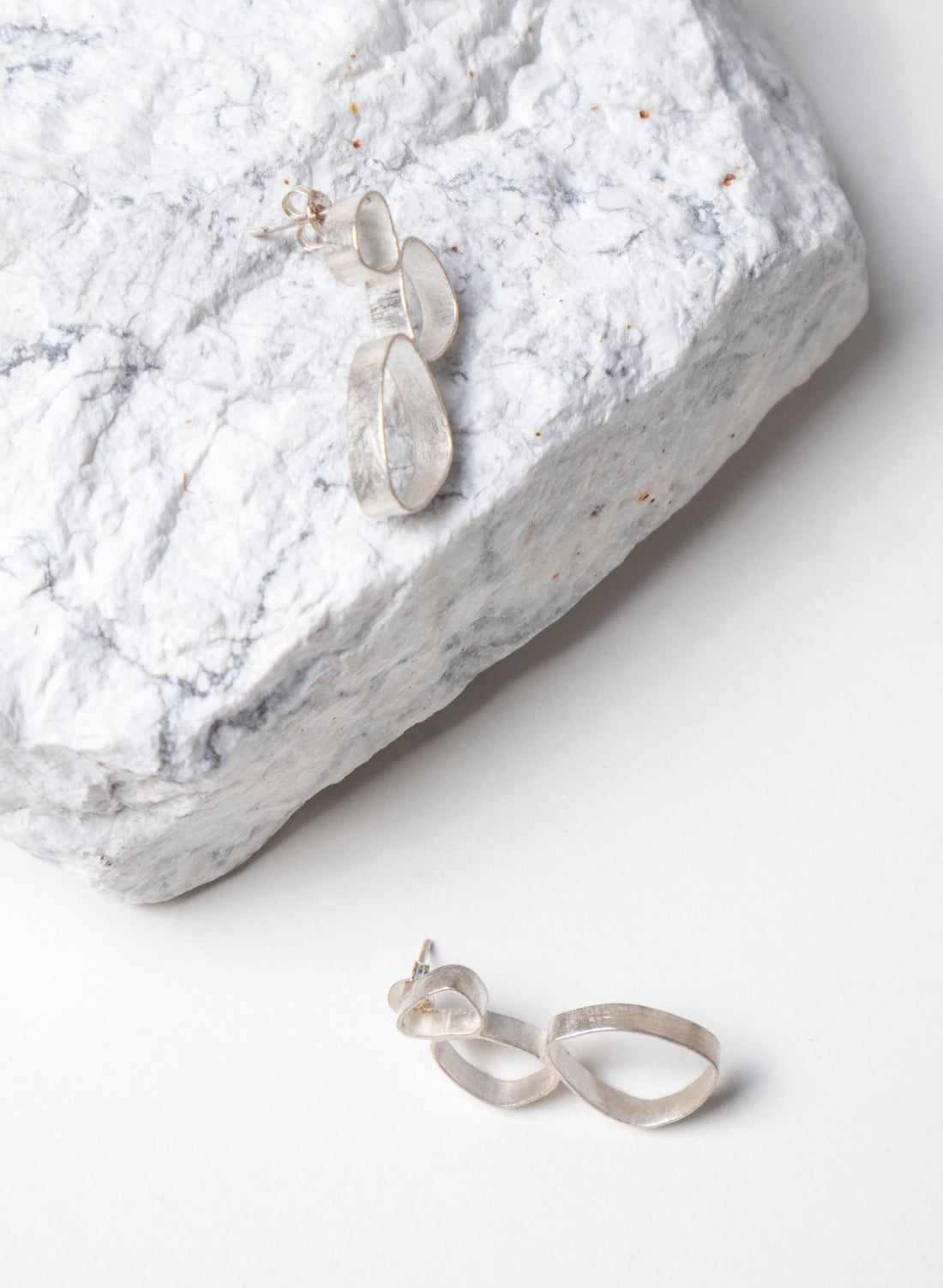 Hollow 3 Pebble Earrings