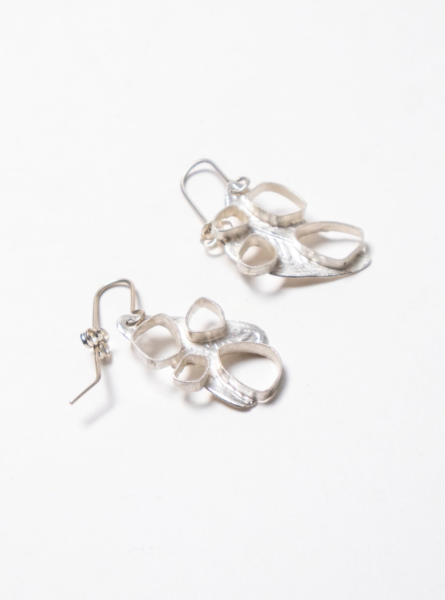 Hollow 4 Pebble Earrings