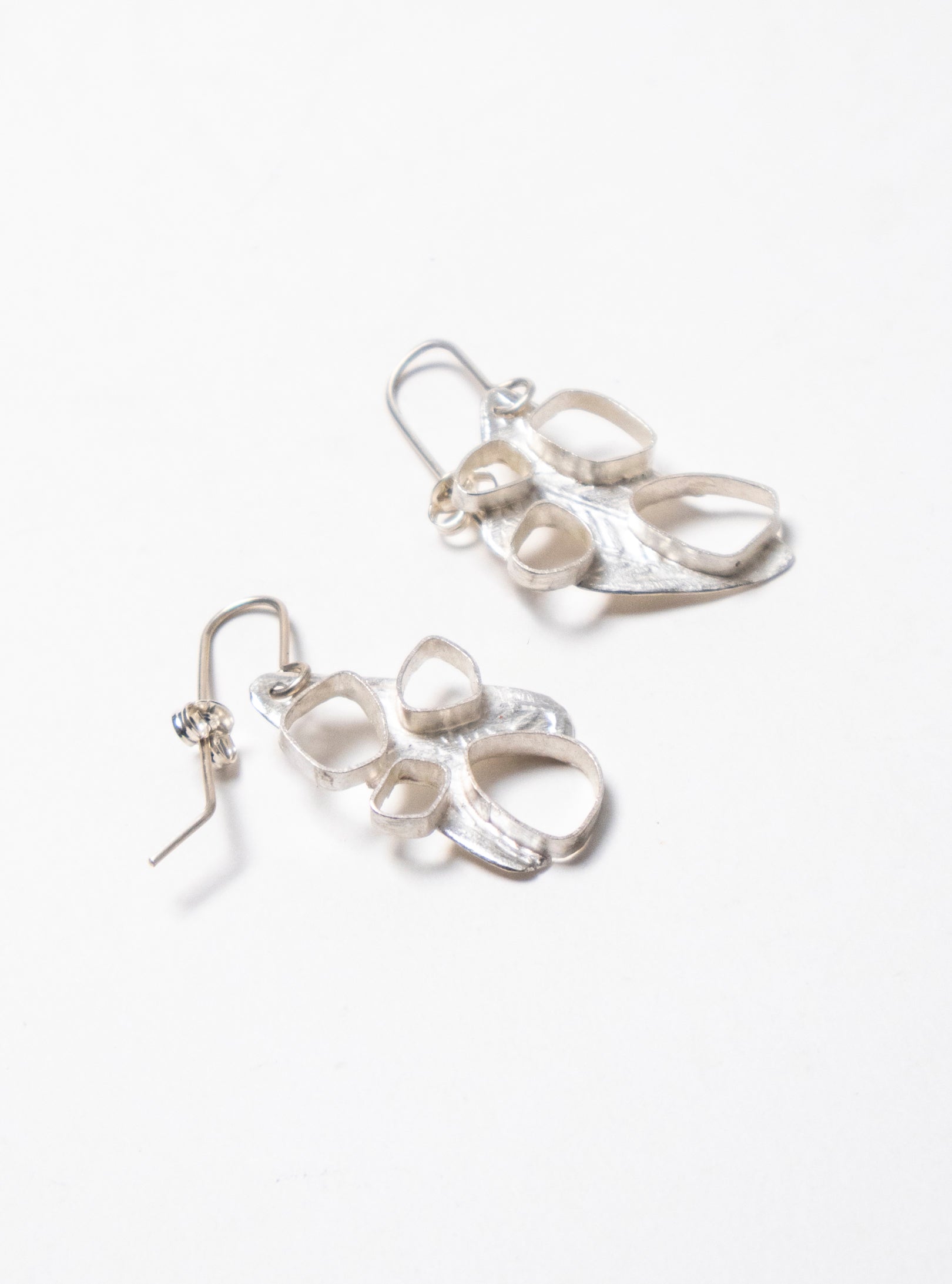Hollow 4 Pebble Earrings