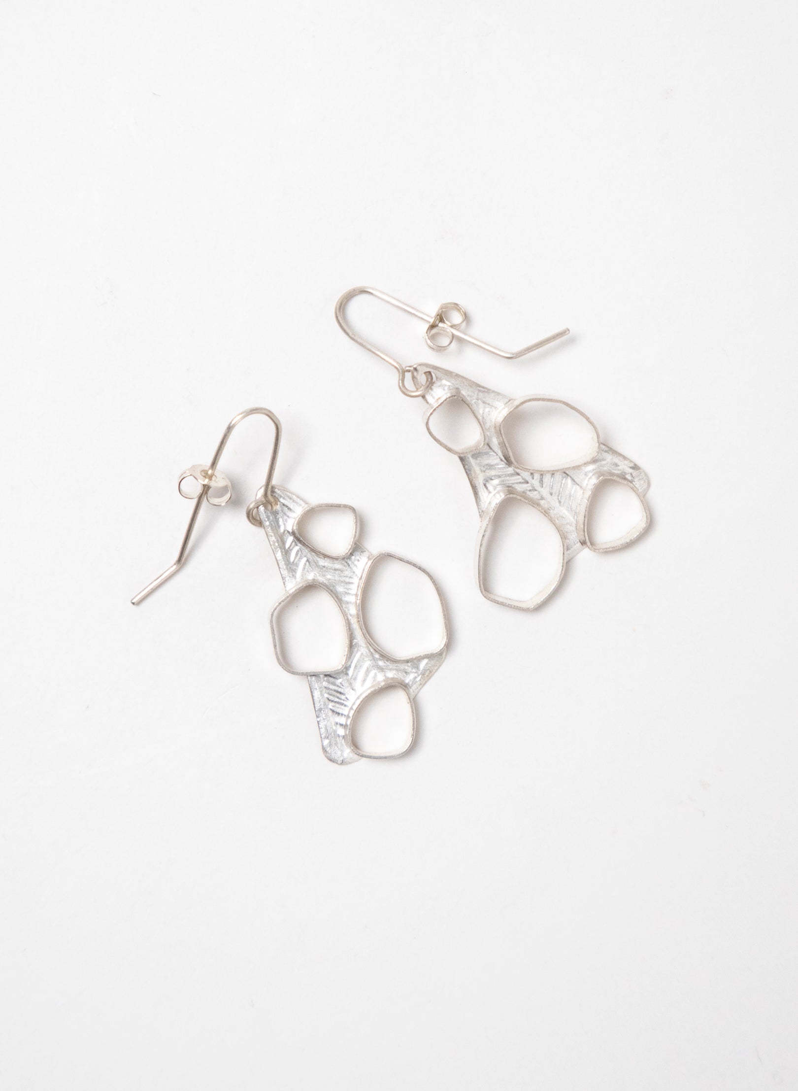 Hollow 4 Pebble Earrings