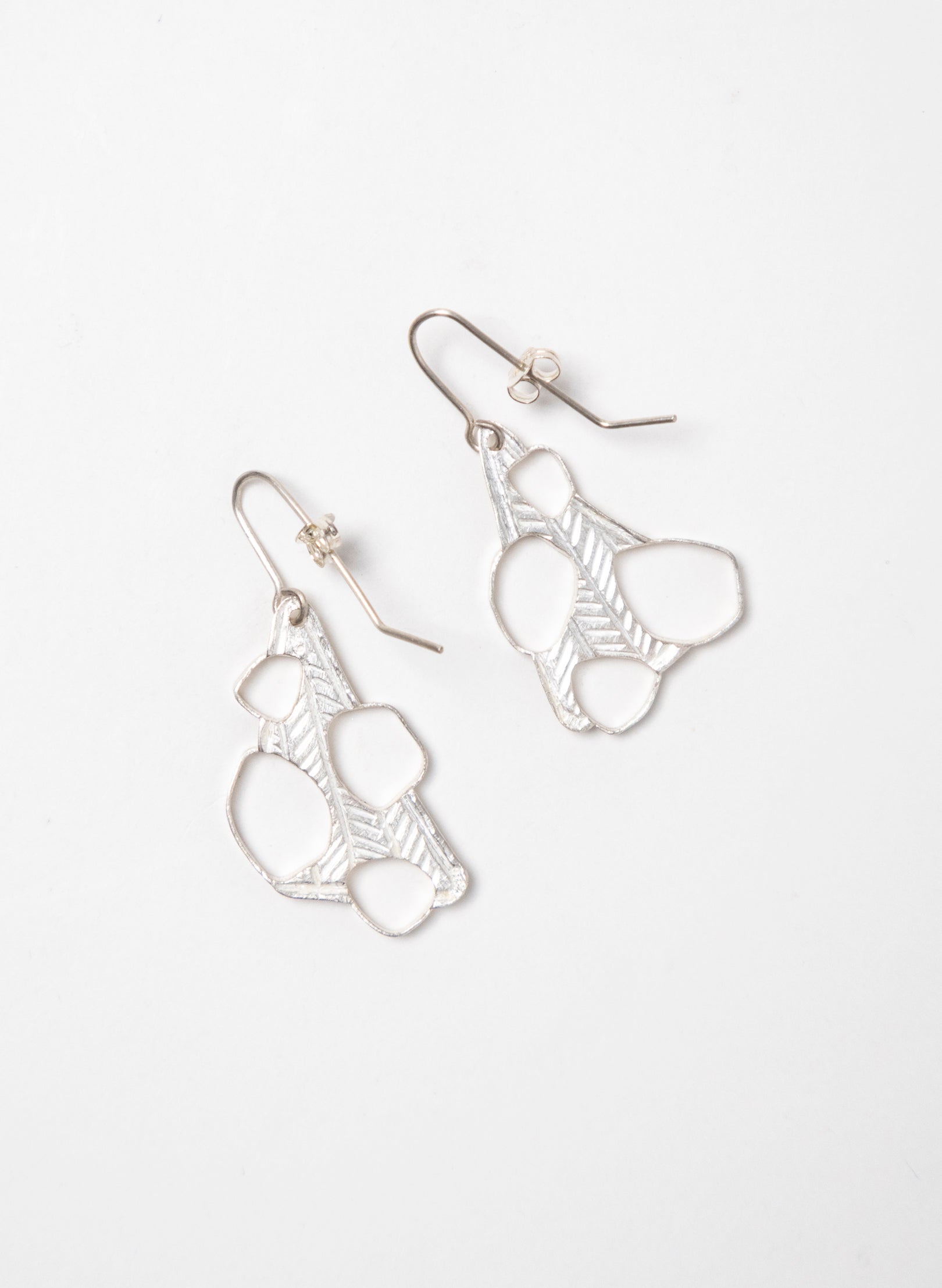 Hollow 4 Pebble Earrings