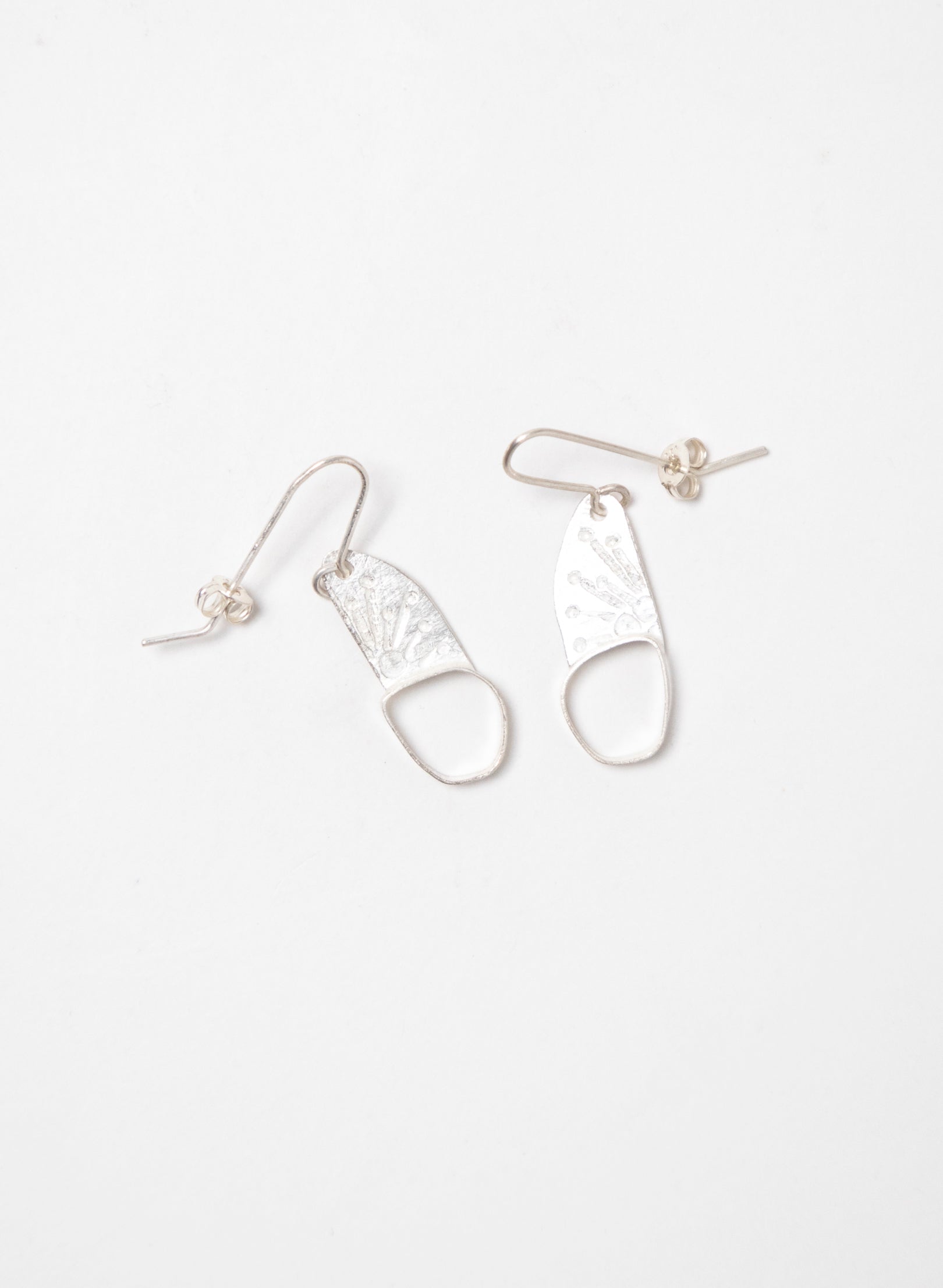 Hollow Single Pebble Earrings