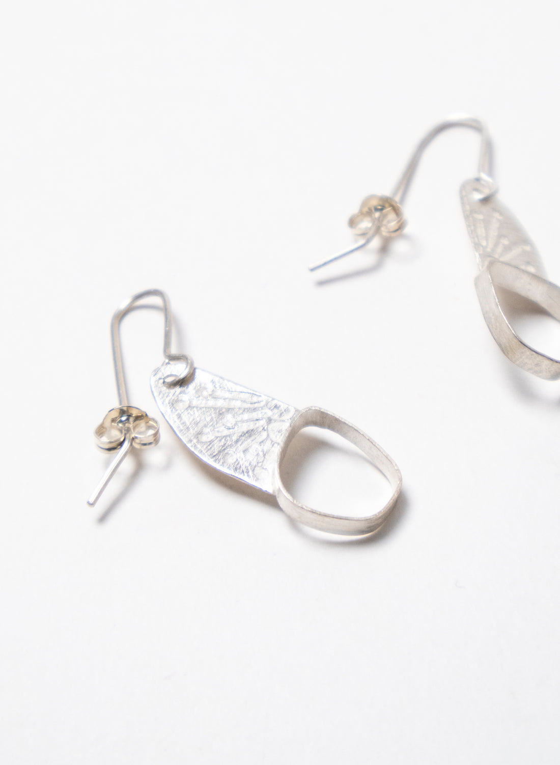 Hollow Single Pebble Earrings