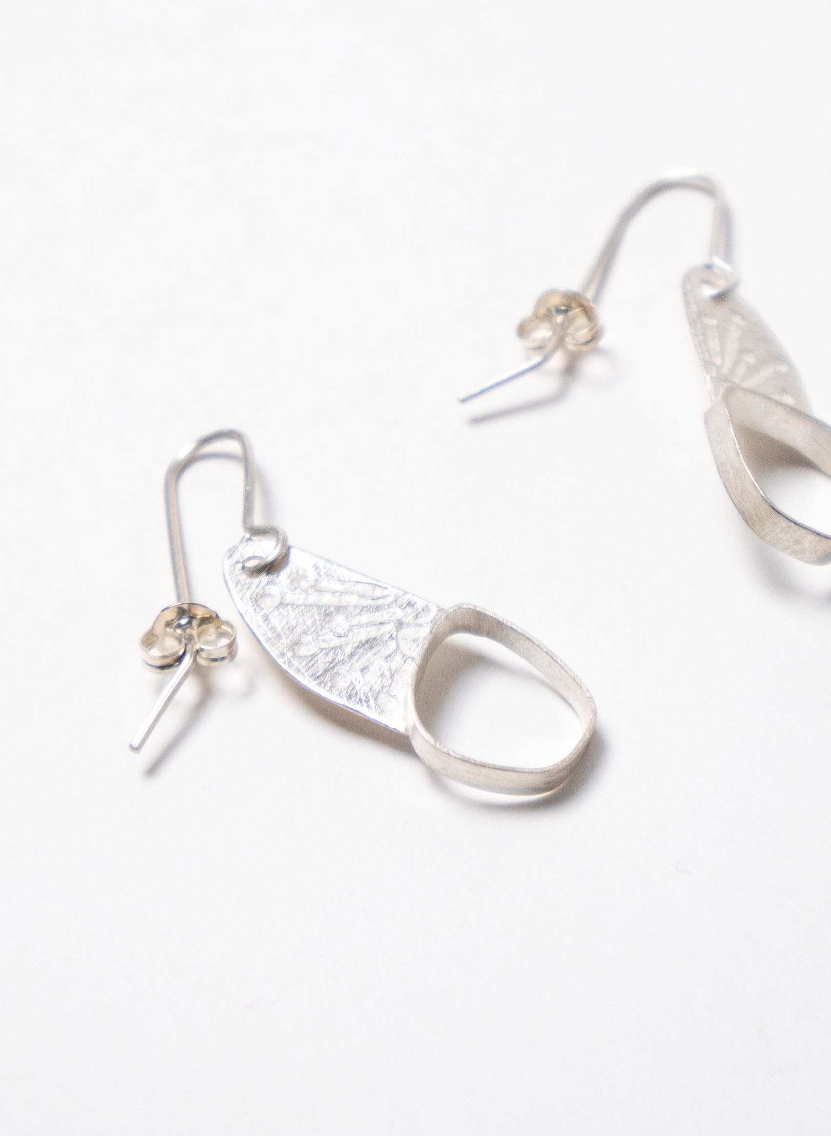 Hollow Single Pebble Earrings