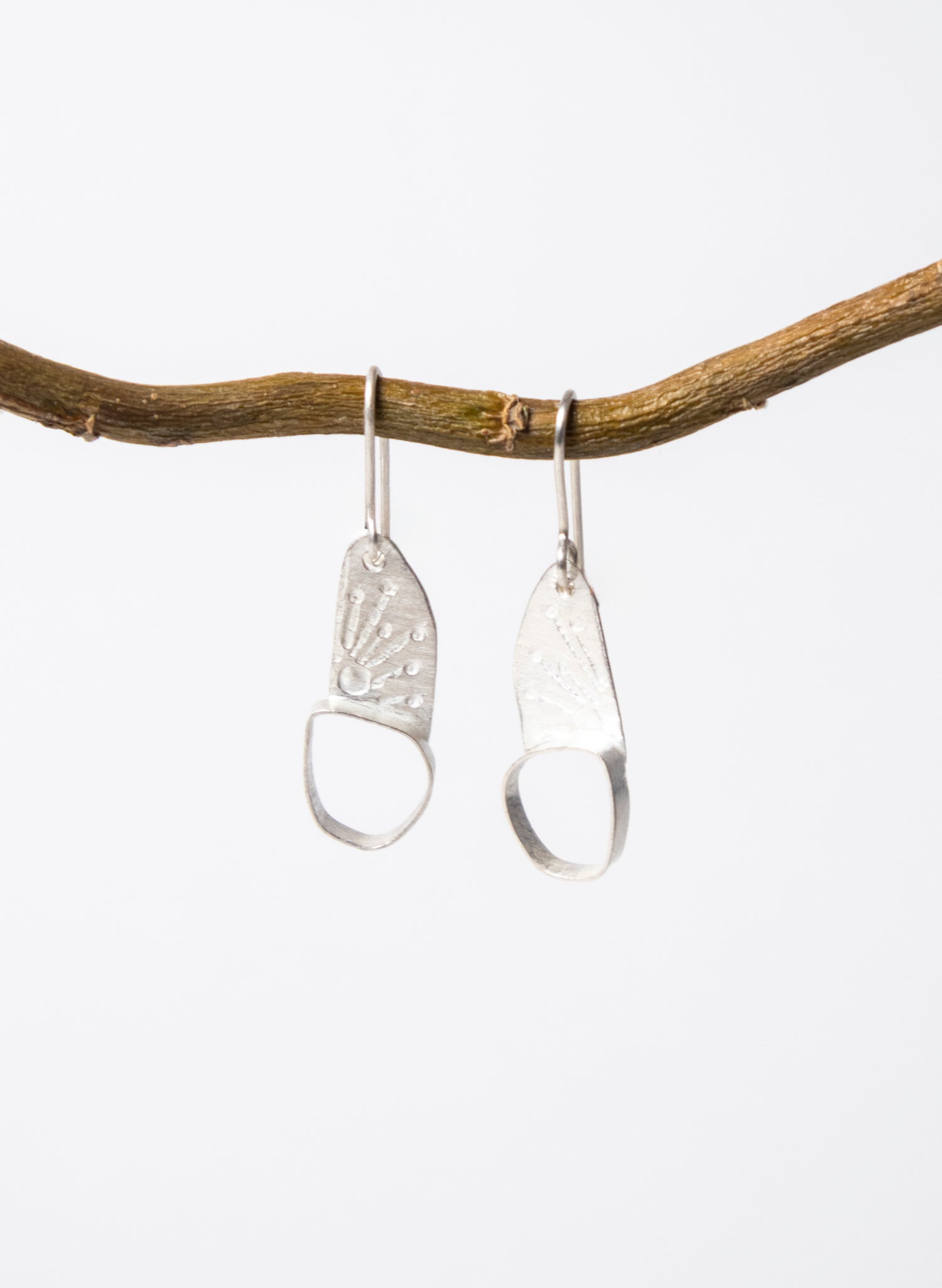 Hollow Single Pebble Earrings