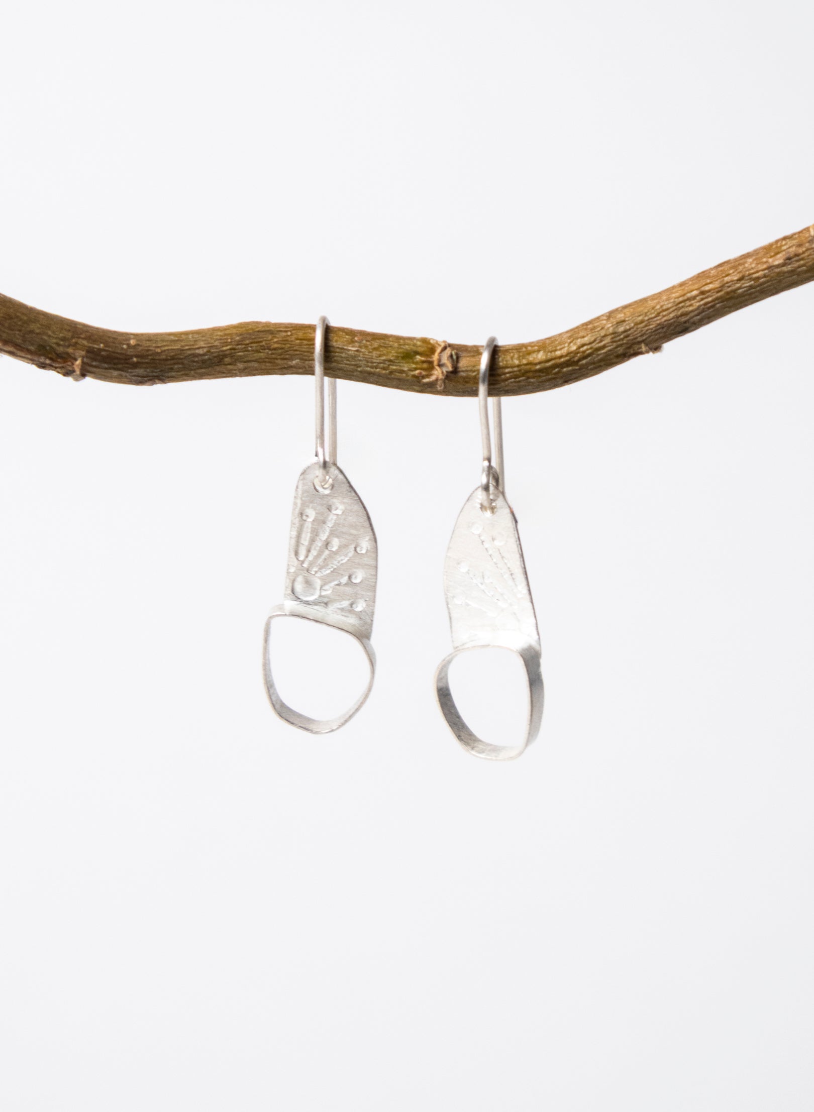 Hollow Single Pebble Earrings