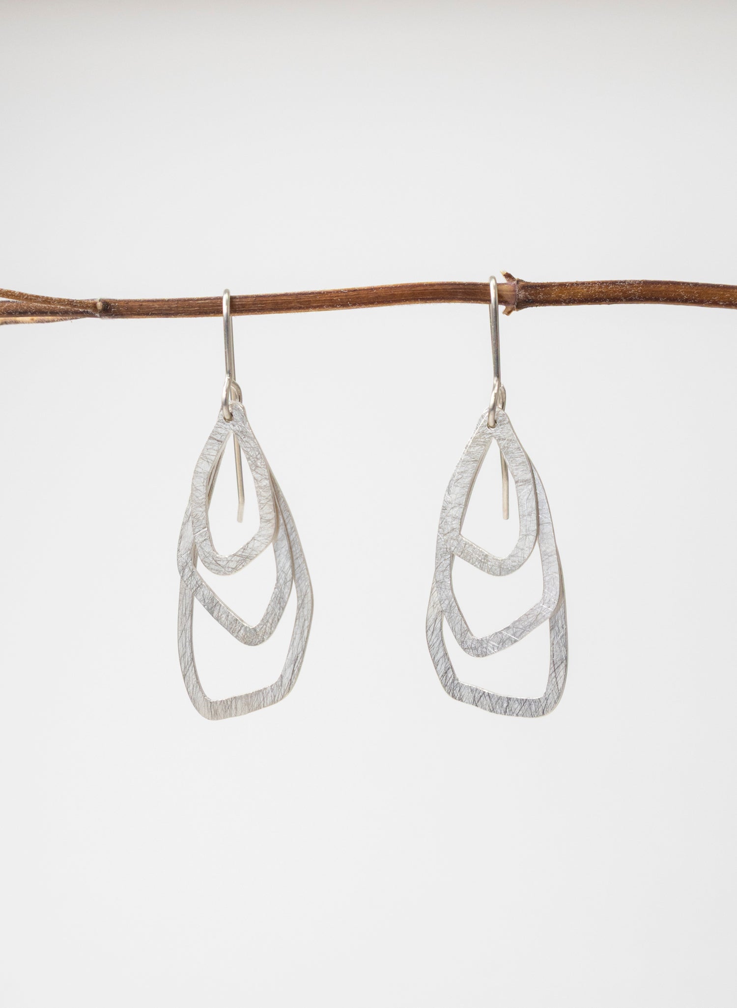 Asymmetric Swinging Pebble Earrings