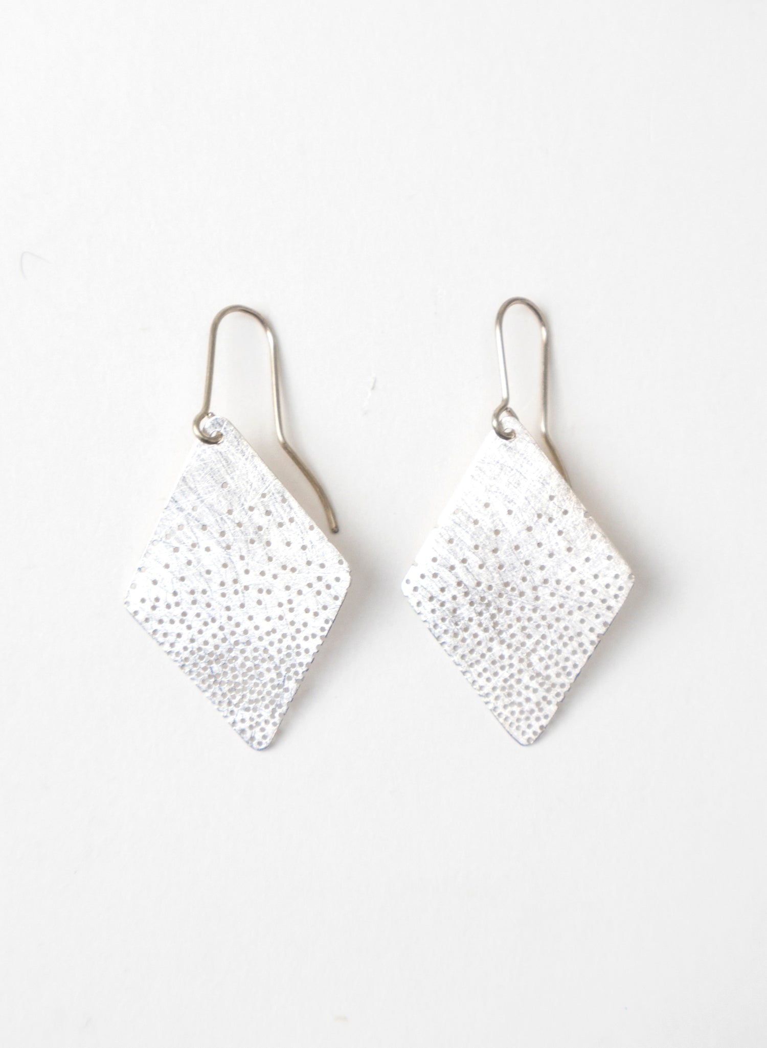 Tiny Hole Earrings