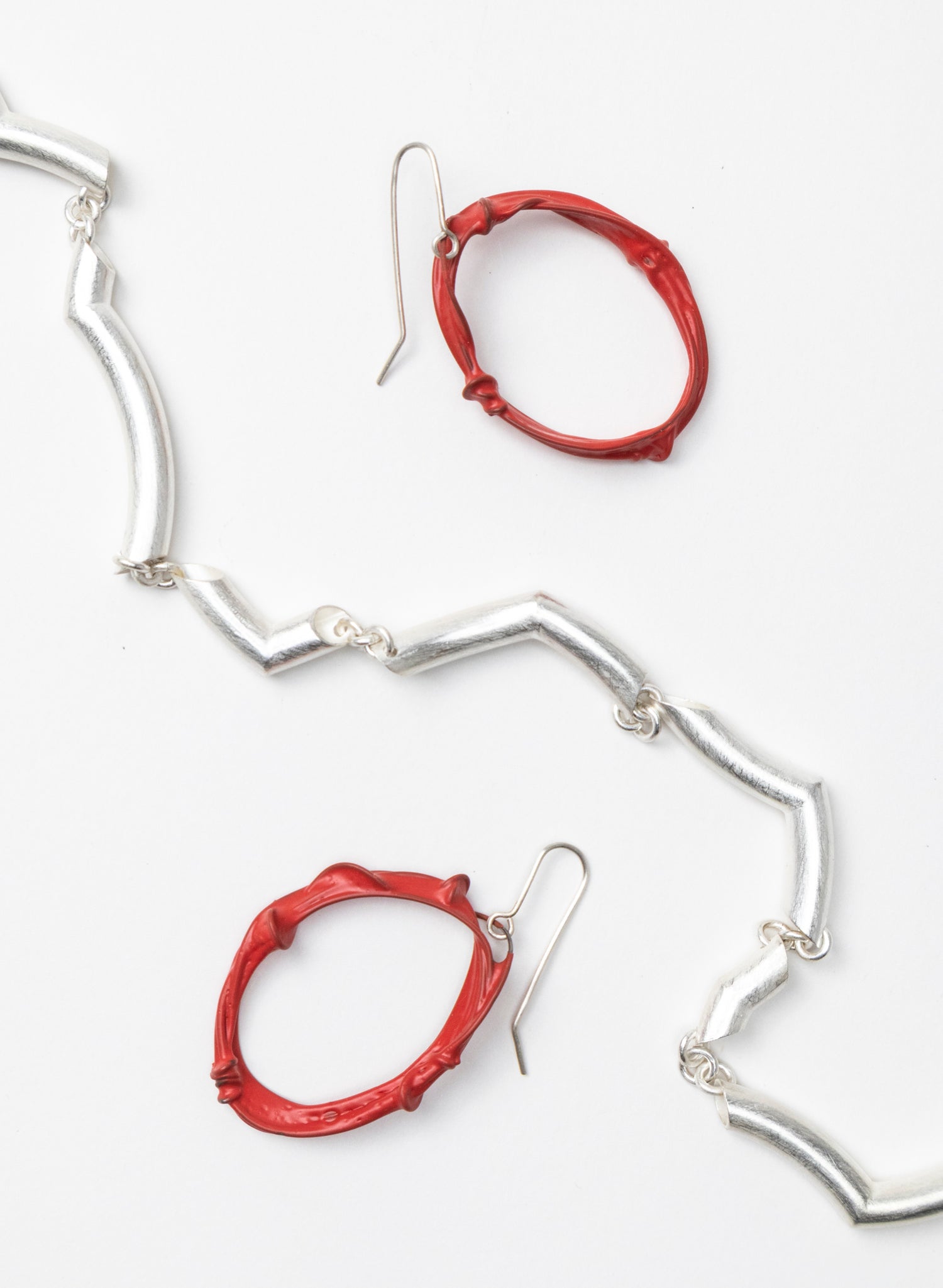 Twist And Turn Oval Earrings