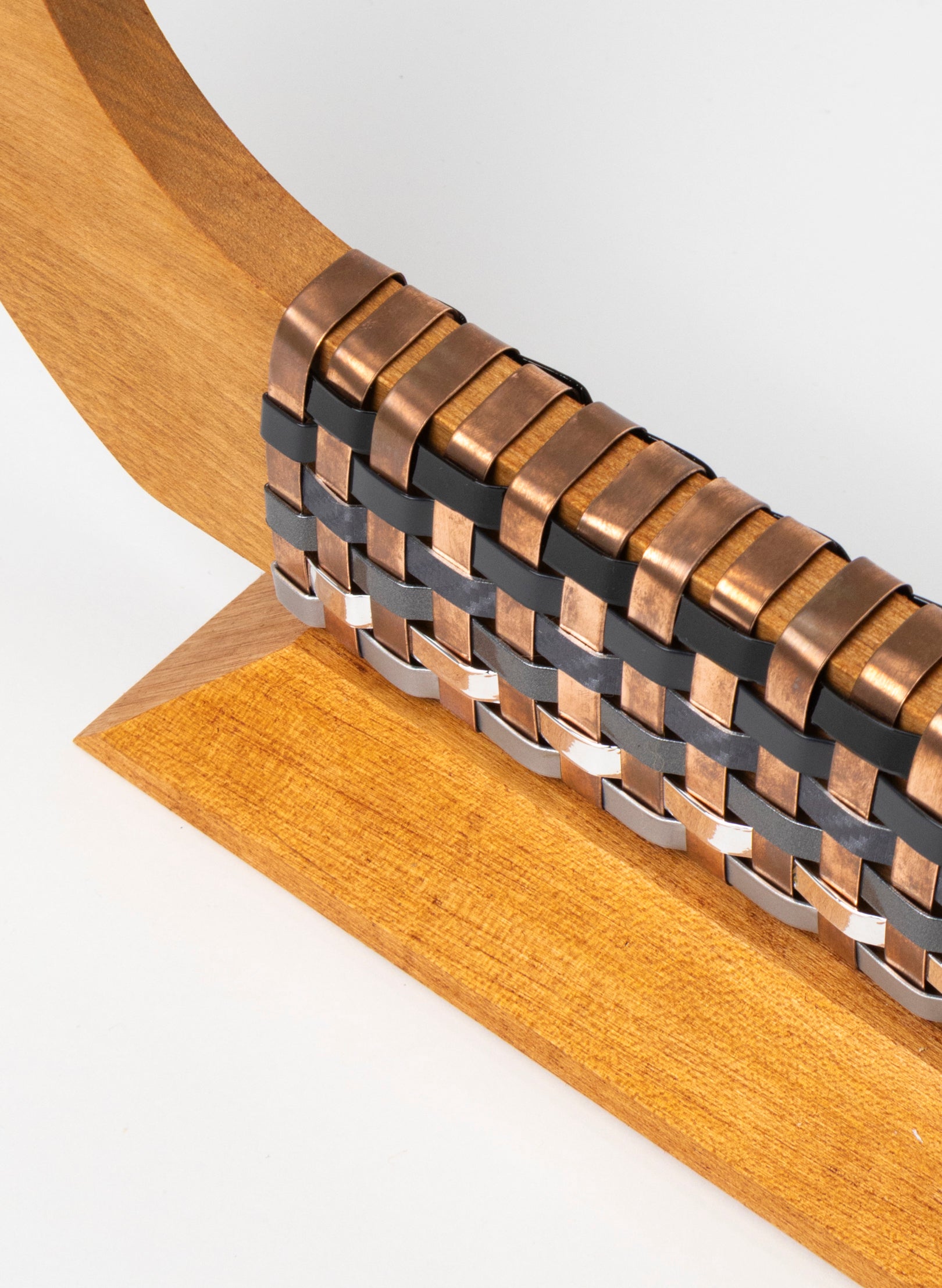 Black, Silver and Copper Waka on Plinth