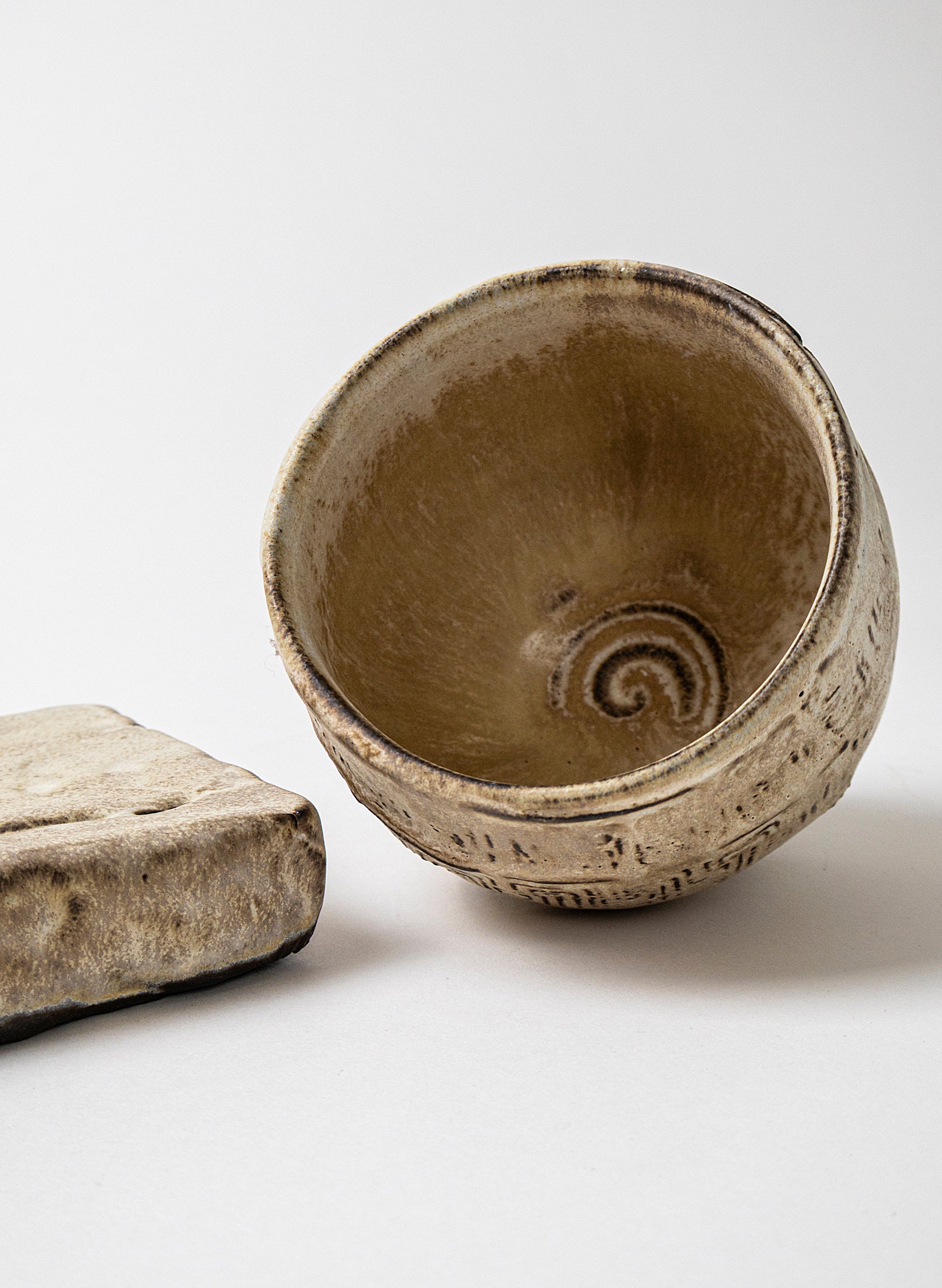 White Ceramic Cup on Pedestal