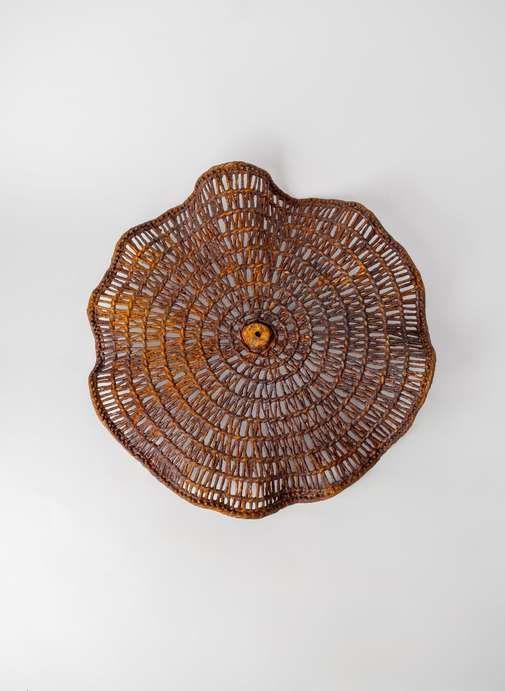 Woven Reed, Iron Pigment and Ceramic Tide Catcher