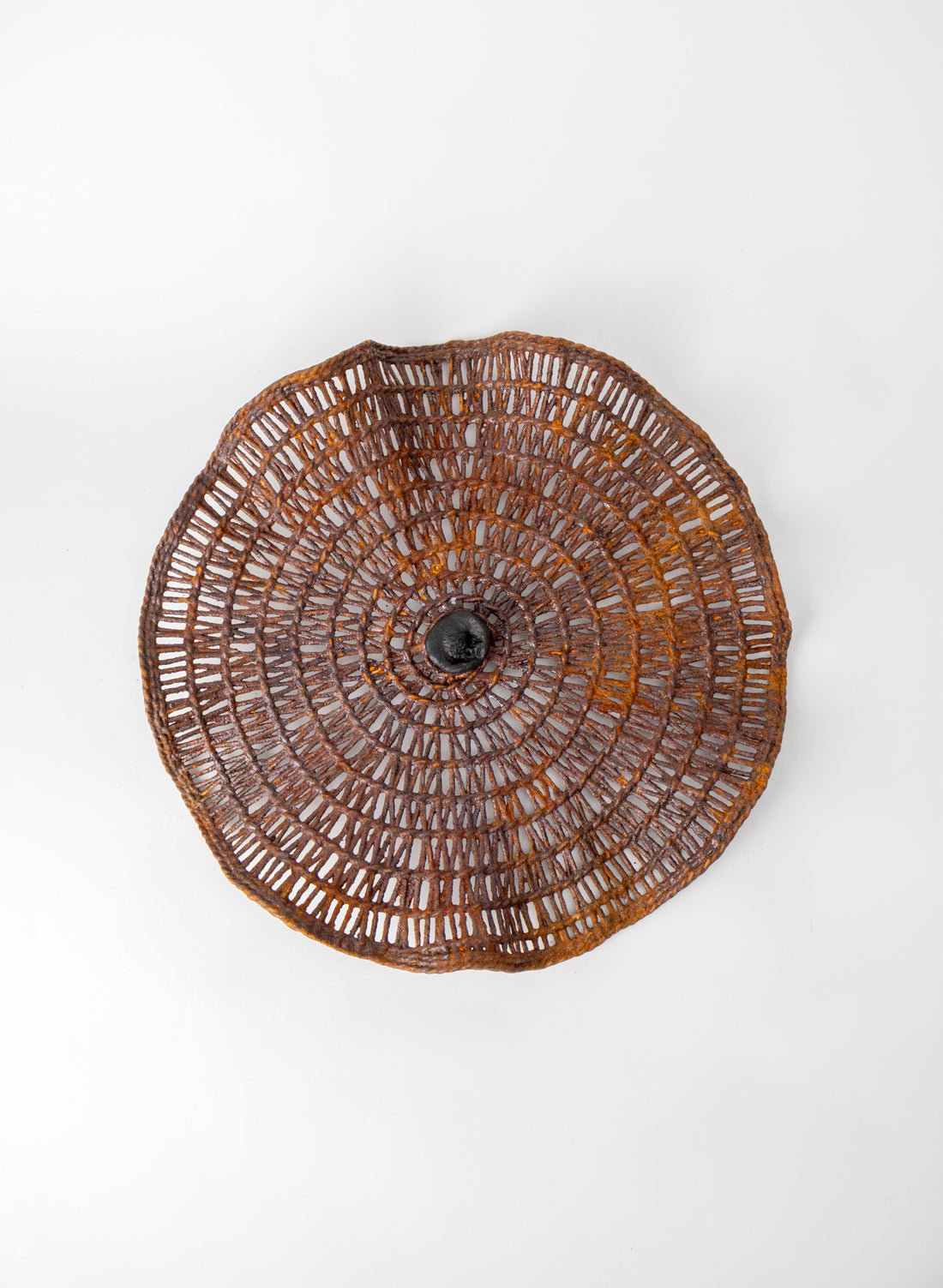 Woven Reed, Iron Pigment and Ceramic Tide Catcher