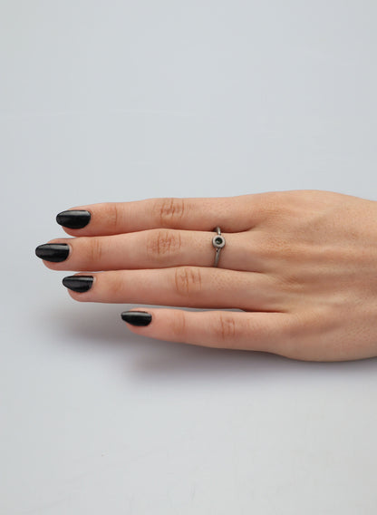 Faceted Untreated Emerald Titanium Ring