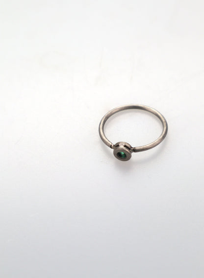 Faceted Untreated Emerald Titanium Ring