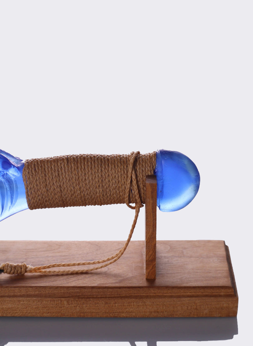 Blue Lead Crystal Glass Wahaika  with a Pūkaiora (figure) on an Oak base